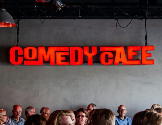 The image of the "comedy cafe sign"